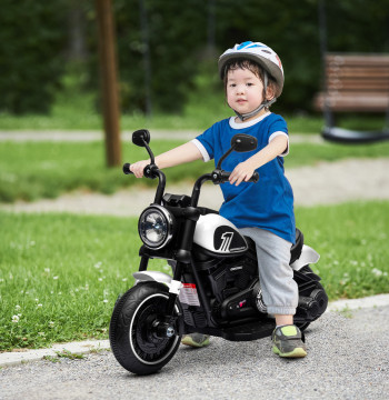 Moto électrique pour enfants de 18-36 mois Moto électrique pour bébé avec batterie 6v phare et roues auxiliaires Charge amovible 25 kg 76x42x57 cm Blanc